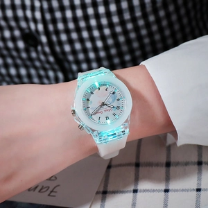 Luminous student watch with mermaid dial and soft white silicone strap worn on wrist