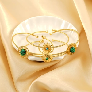 Vintage gold plated titanium steel cable bracelets set with turquoise devil eye patterns