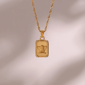 Detail of gold angel plaque pendant with four-corner zircon stones and twisted chain