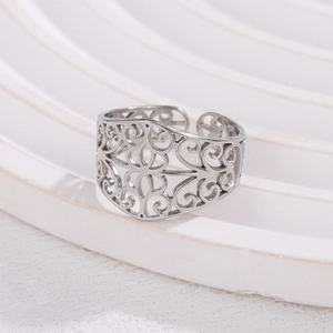 Silver hollow pattern stainless steel ring with elegant vintage design and adjustable band