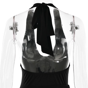Detail of black halter neck top with tie-back design on a transparent mannequin