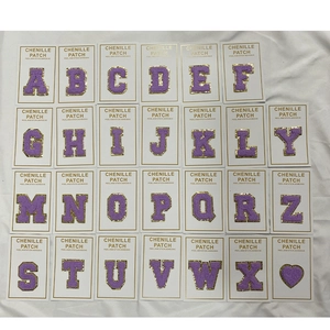 Full set of purple chenille alphabet patches with gold glitter borders and adhesive back