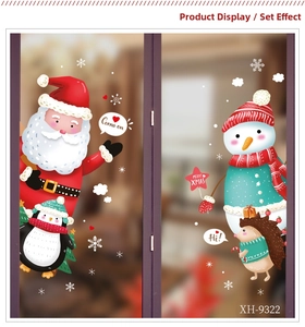 Detail of Christmas window stickers with Santa, snowman and cute animals on glass