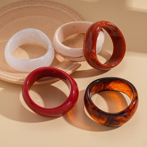 Acrylic tortoiseshell and marble geometric chunky bangles in multiple color variants