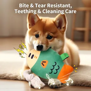 Quietschendes fischförmiges Hundekauspielzeug mit Baumwollseil, von Shiba Inu benutzt