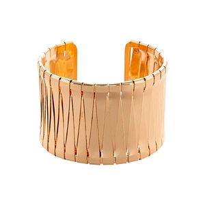 Polished gold irregular geometric wide cuff bracelet with metallic glossy finish