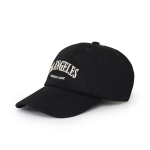 Close-up of Los Angeles 3D embroidery on a black cotton twill baseball cap