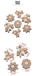 Detailed view of mixed pearl and rhinestone DIY charms with size measurements