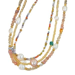 Multilayer beaded necklace with freshwater pearls and colorful natural stones on white background