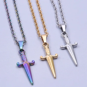 Detailed comparison of three dagger pendants in rainbow, gold, and silver stainless steel