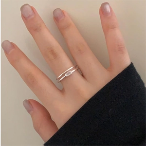 Detailed view of a double-layered S925 silver ring featuring a rectangular zircon stone