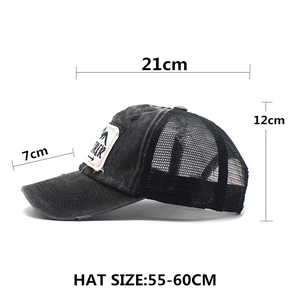 Detailed size chart of a vintage black mesh trucker hat with Explorer Dreamer patch