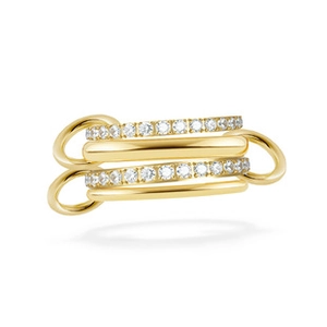 Macro shot of gold-plated multi-link ring featuring sparkling clear crystal accents