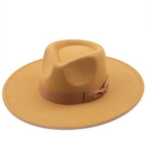 Close-up of wide brim wool fedora hat with matching grosgrain ribbon and bow detail