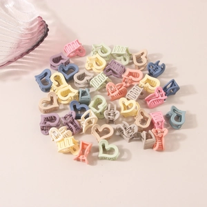 Pastel heart hair claws in matte plastic, colorful mini clip assortment for styling
