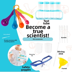 Detailed science kit for kids featuring test tubes, pipettes, and safety goggles