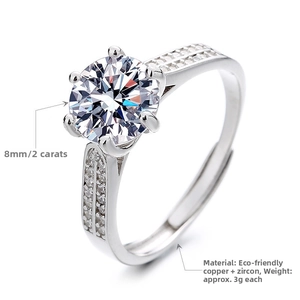 Macro shot of 2ct six-prong silver ring with 8mm zircon and paved double row side stones