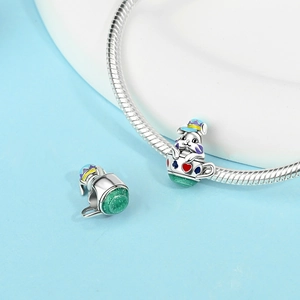Silver rabbit in teacup charm with heart patterns on a snake chain bracelet