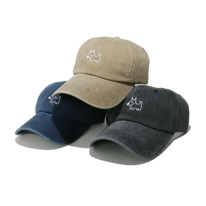 Detailed embroidery of cartoon puppy on washed cotton baseball caps in three colors