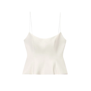 Minimalist white spaghetti strap camisole featuring a pleated peplum hem on plain background