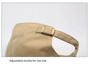 Detail of adjustable metal bronze buckle on khaki cotton baseball cap for custom fit