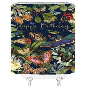 Detail of blue butterfly shower curtain with tropical leaves and Happy Birthday text