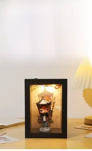 Detail of black rectangular DIY display box with warm LED lighting for blind box figures