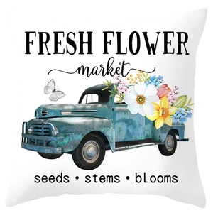 Pink floral wreath pillow cover with Fresh Flower Market text on white background