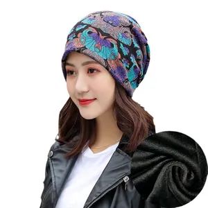 Women's warm winter beanie with paisley pattern and thick black fleece lining