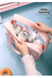 Close-up of pink transparent wash bag with wide opening showing large storage capacity
