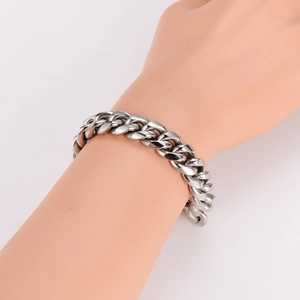 Men's silver stainless steel Cuban chain bracelet with a polished finish and thick links