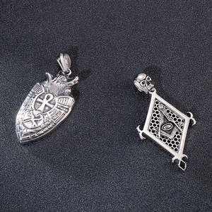 Gothic silver pendants featuring Ankh wolf shield and Masonic skull eye designs