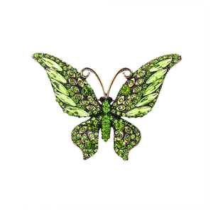Elegant butterfly brooch in bronze finish with sparkling green crystal rhinestones