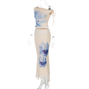 Detail of floral print off-shoulder crop top and asymmetrical skirt in light chiffon