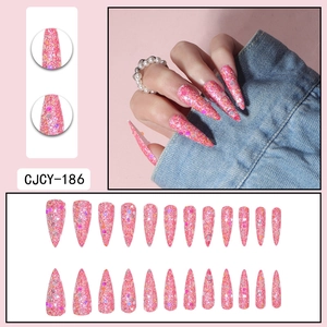 Long stiletto press-on nails in bright pink with colorful glitter sequins and 24 pieces
