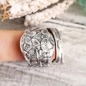 Vintage floral engraved silver spoon ring with intricate botanical embossed patterns