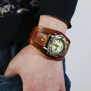 Punk vintage brown leather cuff watch for men with a large compass bezel and quartz dial