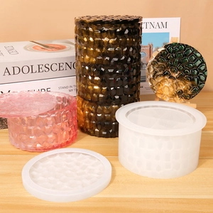 Macro detail of honeycomb texture silicone molds and finished resin storage boxes