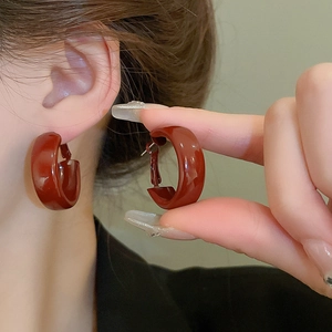 Vintage retro red C-shape hoop earrings with glossy finish for women's fashion