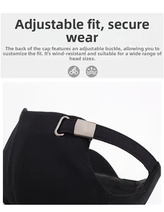 Detail view of adjustable metal buckle on back of black cotton baseball cap
