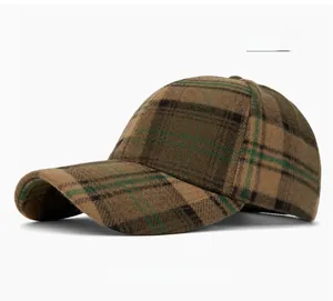 Detail shot of the vintage plaid pattern and thick fabric texture on this baseball cap