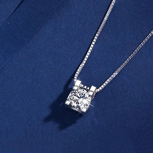 925 silver bull-head necklace with a brilliant round-cut zircon on a dark blue background