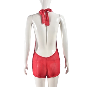 Detail of red knitted romper back with halter neck and tight breathable fabric texture