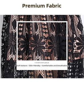 Close-up of black floral hollow lace fabric with breathable texture and soft lining