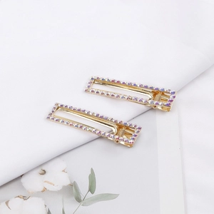 Elegant gold rectangular hair clips with sparkling purple rhinestones for women
