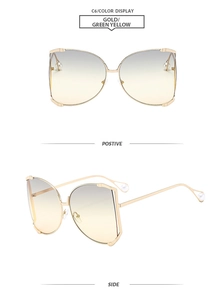 Detail of square gold metal sunglasses with gradient lenses and pearl temple tips