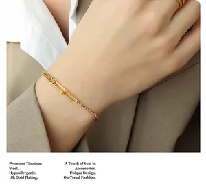 Close-up of minimalist titanium steel square bead bracelet with 18k gold plating on model
