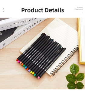 Detail view of 18-pack 0.4mm fineliner pens neatly arranged on a spiral notebook