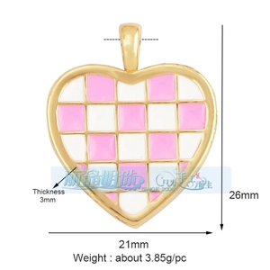 Detail view of heart-shaped pendant featuring pink and white checkered enamel finish