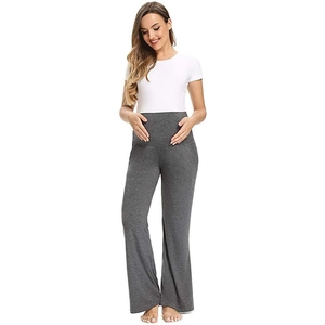 High-waisted maternity pants in dark grey knit with loose wide-leg design for comfort